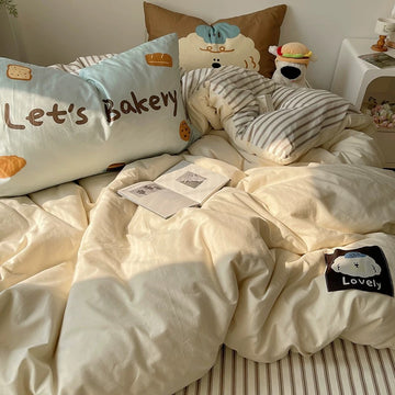 Close-up of kawaii dog embroidery on soft cotton duvet cover