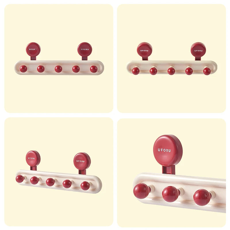 Colorful adhesive wall hook rack displayed with five rounded hooks and everyday accessories hanging nearby.