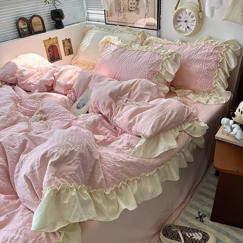 Green pastel coquette-style duvet set with matching lace pillow shams