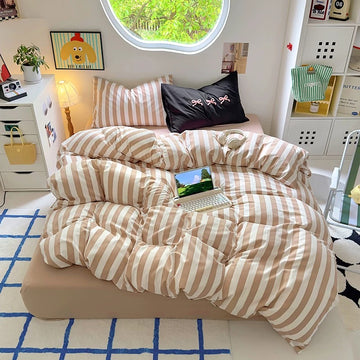 Beige striped cotton bedding set styled in a soft girl dorm room