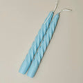 Set of blue pastel spiral candles for aesthetic home settings