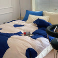Cozy soft bedding with large flower prints, ideal for dorms