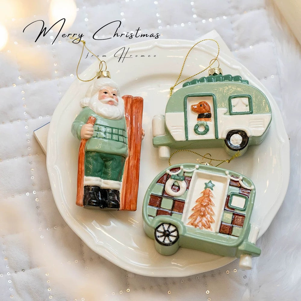 Green Christmas ornaments show a polar bear, a house on wheels and a brown bear on a round checked panel.
