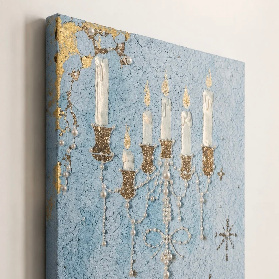Angled close-up of blue candelabra canvas art showing the printed candle details