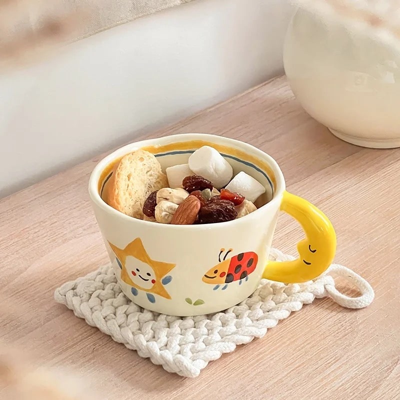 Creative yellow ceramic coffee mug with dog pattern and moon handle. Cute gift for kids and breakfast milk lovers.