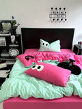 Aesthetic pink and green bedding set for cozy bedroom decor