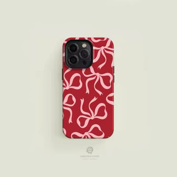 Red phone case with pink bows for iPhone 16, 15, 14