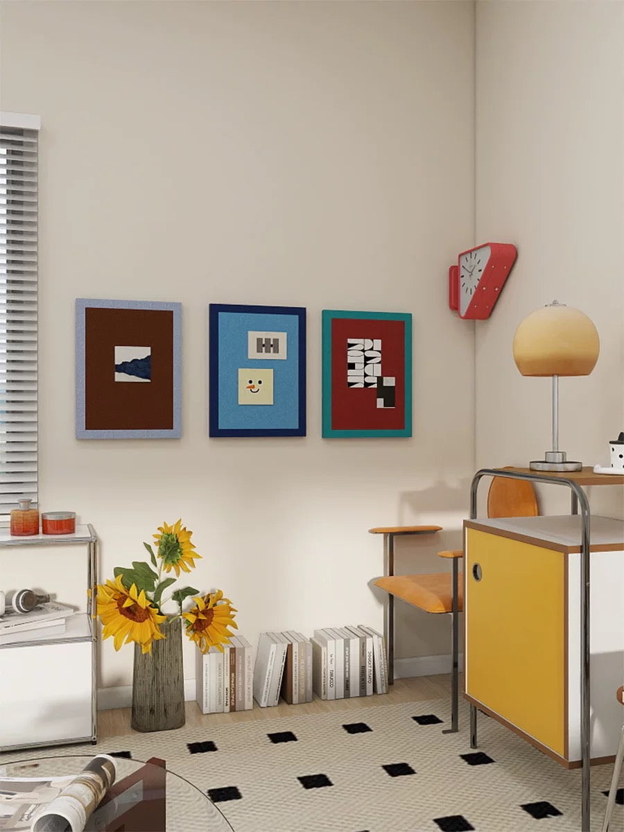 Decorative felt pin boards for wall display in a bright dopamine-style room.