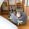 Soft rabbit fur pet bed with a non-slip base