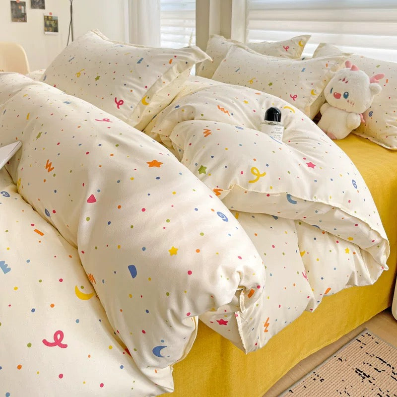 Soft girl bedroom scene with plush toy and yellow duvet cover on a dorm bed