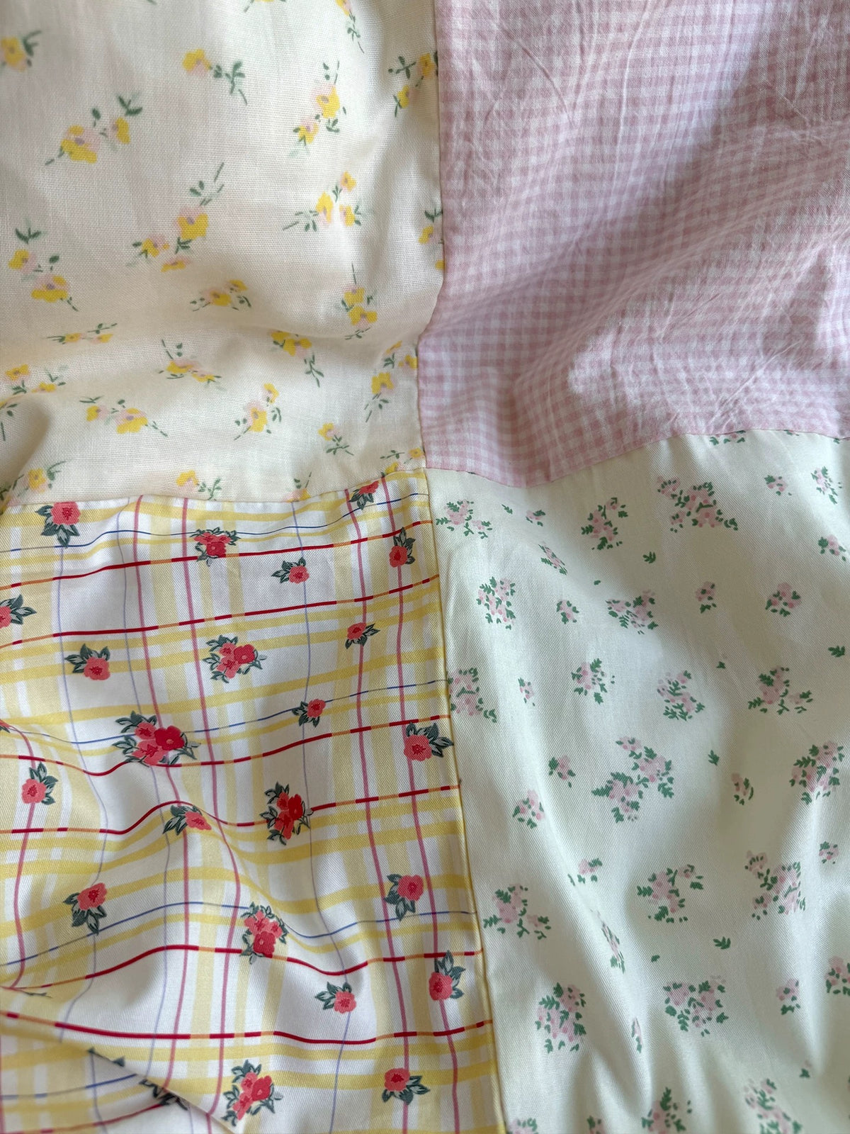 Close-up of floral gingham duvet cover with small flower prints