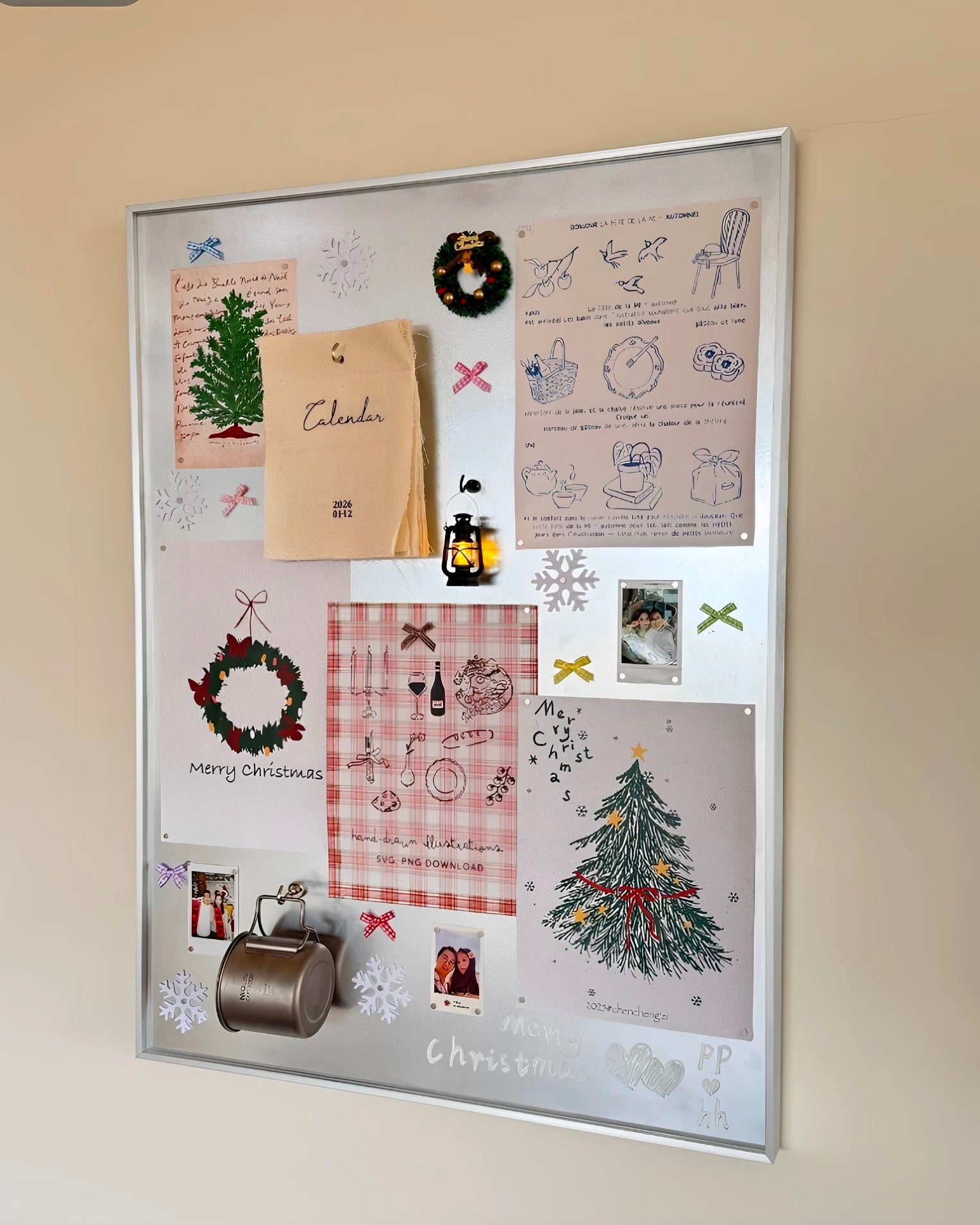 A large white-framed holiday bulletin board mounted on a beige wall, filled with Christmas-themed notes, cards, wreaths, drawings, photos, and small decorative items.