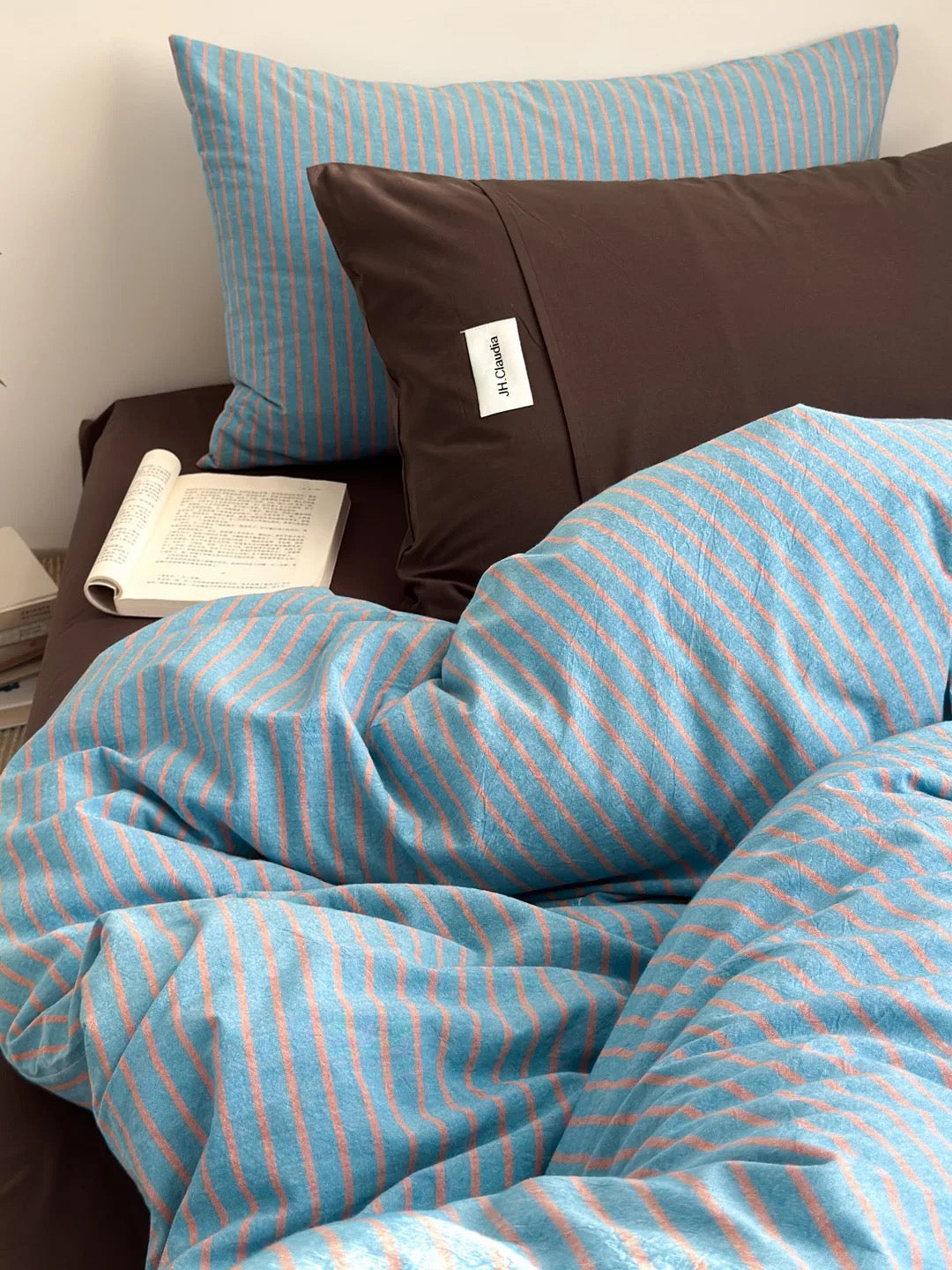 Japandi bedroom palette – blue and brown striped duvet cover set, machine washable.
