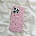 Full-coverage iPhone case with glossy surface and fun polka dot pattern