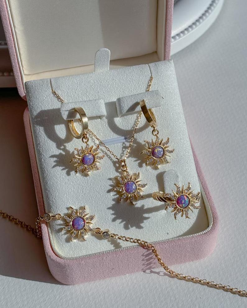 Sun-inspired jewelry set with purple opal stones