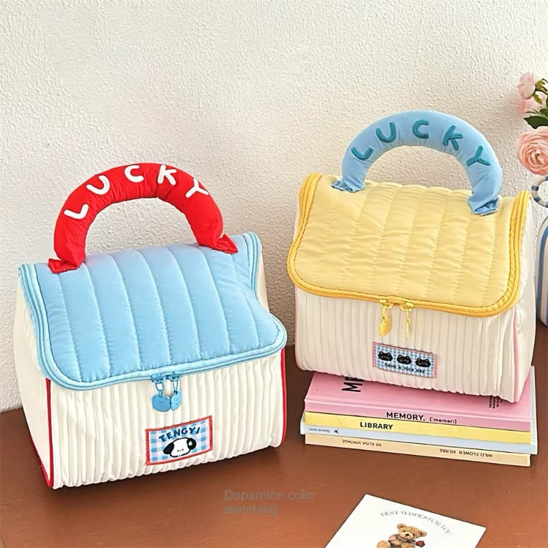 Large capacity cosmetic storage pouch shaped like a cartoon house, portable with waterproof material for travel use