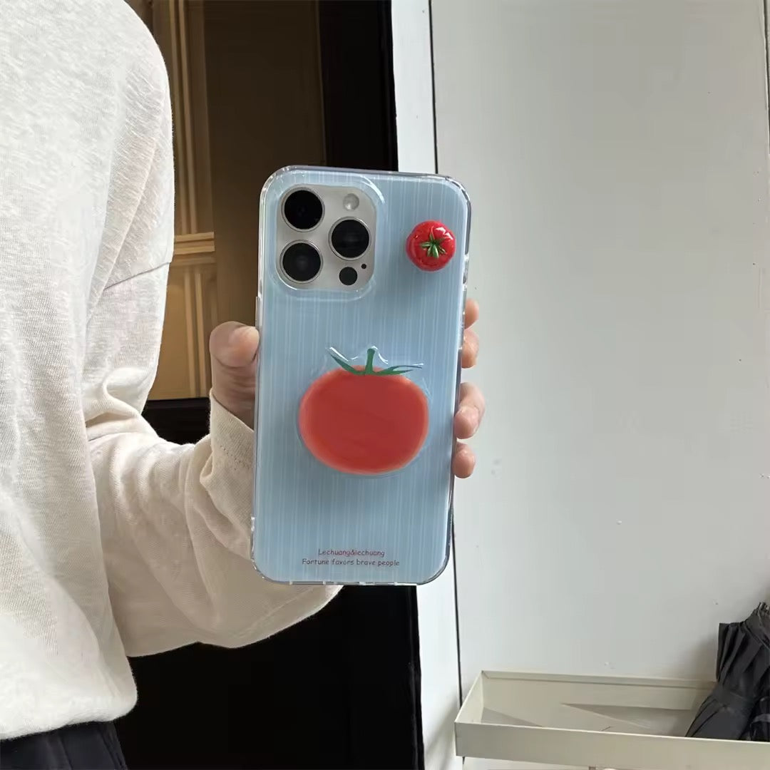 Tomato iPhone case shown on table with matching tomato decor.