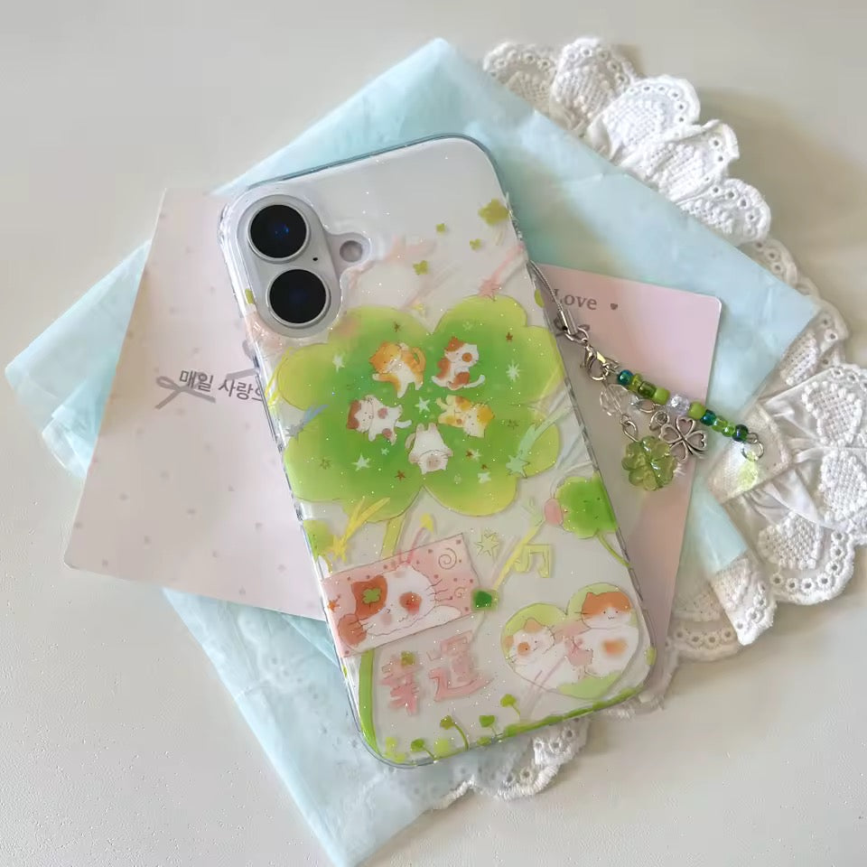 Clear glitter iPhone case with green clover and tiny cats