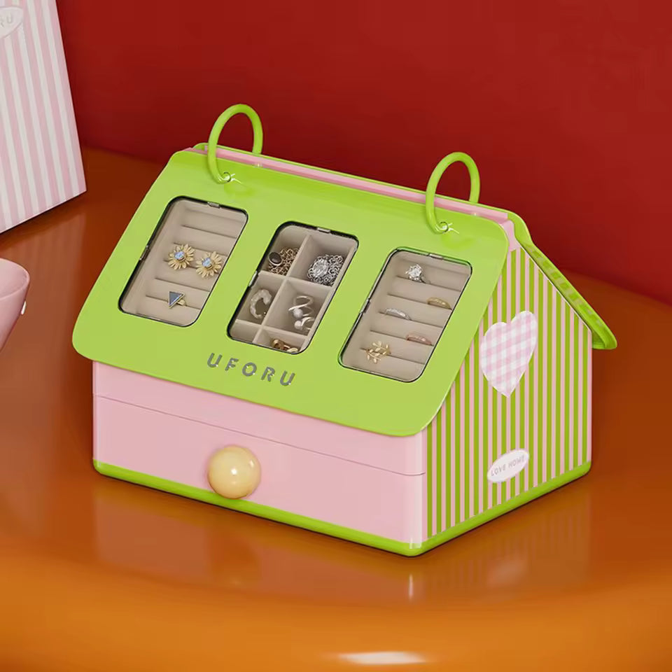 Pink and green jewelry box with 'UFORU' branding on a red background