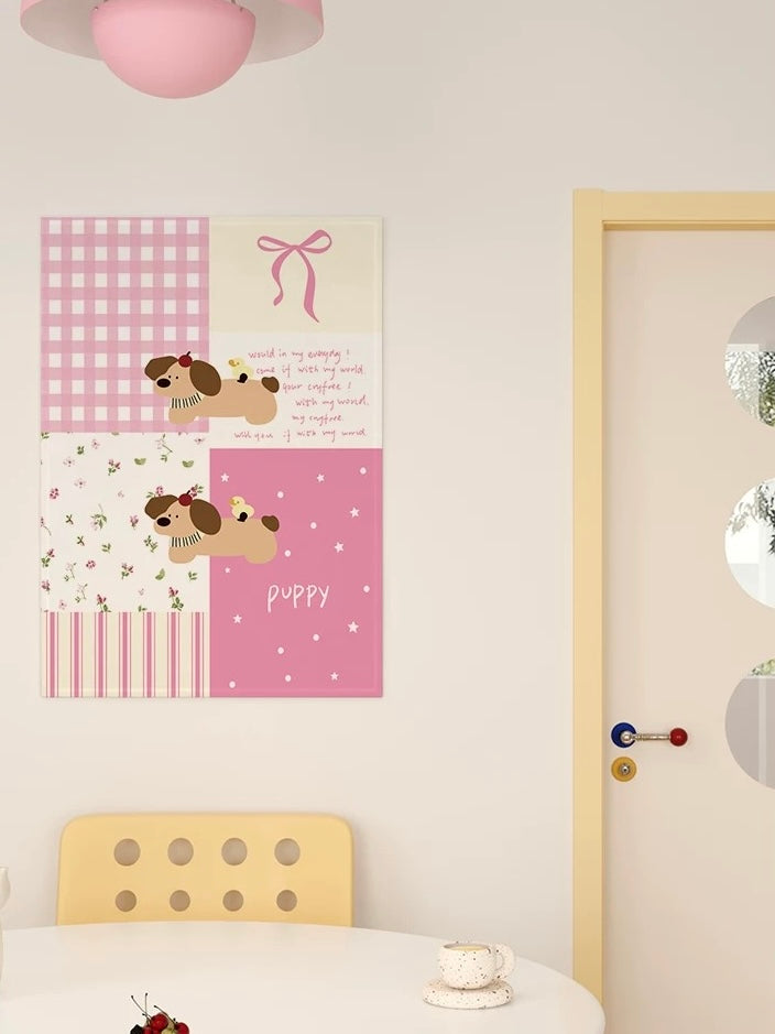 A kawaii tapestry combines puppy illustrations with pink checks, tiny flowers, a bow and striped panels.