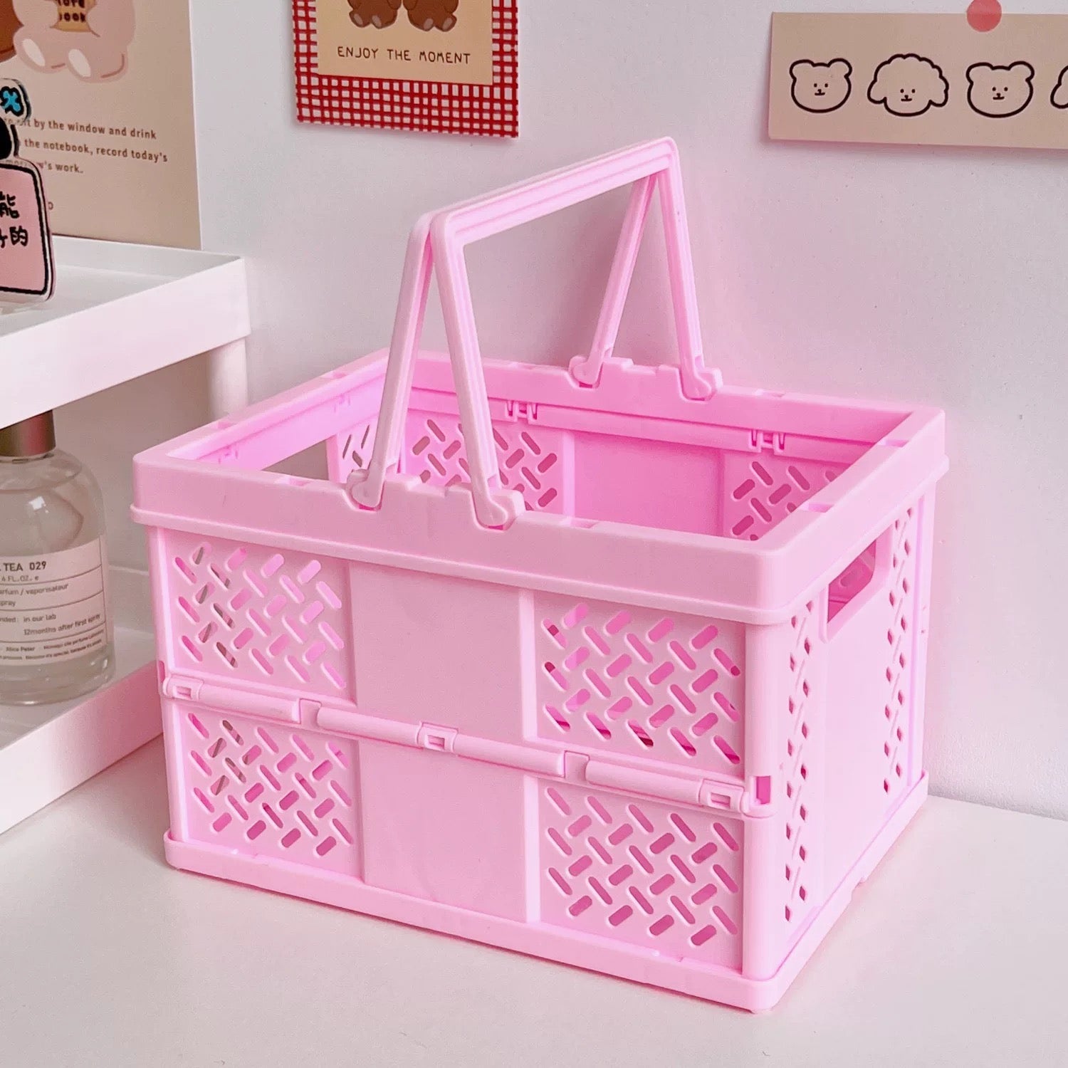Folding organizer box for room decor used to store journals and tech accessories.