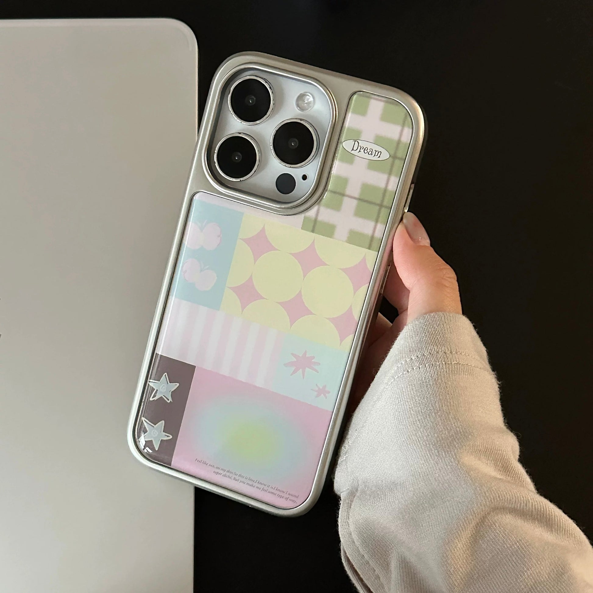Korean soft girl aesthetic iPhone case featuring stars, stripes, and subtle text prints