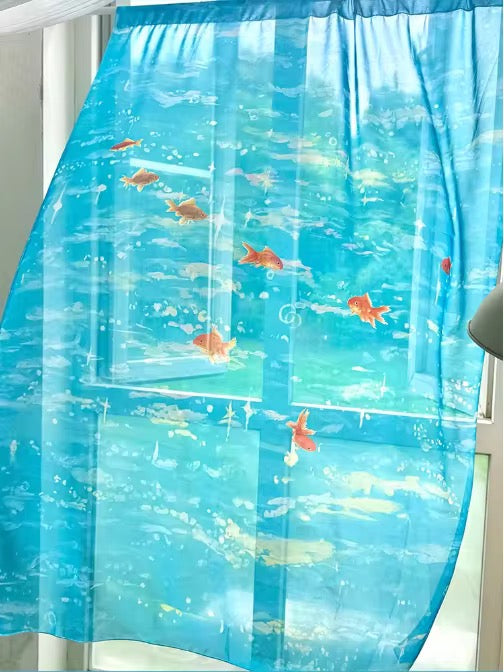 Decorative window blind with fish design on a white wall with plants and a lamp below.