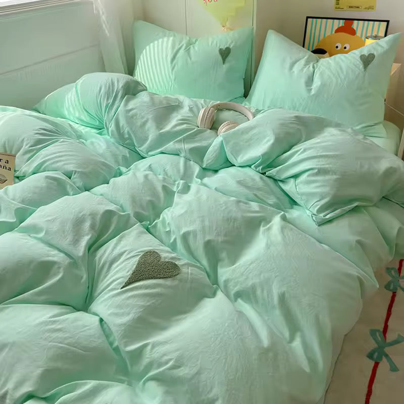 Mint green heart bedding set with soft girl aesthetic in cozy room