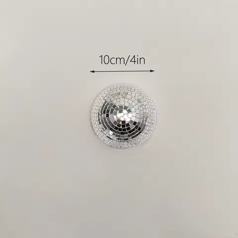 Round mirror with mosaic design and size measurement on a light gray background