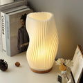 Modern striped desk lamp with touch dimming, USB charging, and wooden base. Eco-friendly 3D printed PLA lampshade for bedside decor.
