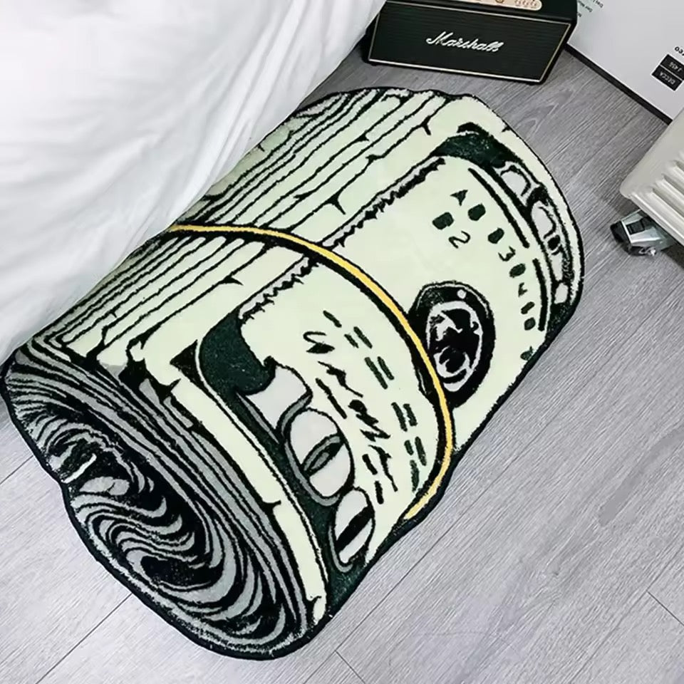 Close-up of the shaggy polyester rug shaped like a bundle of dollar bills