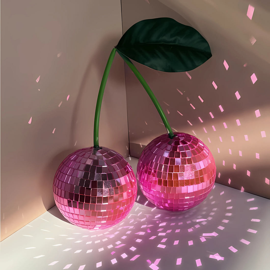 Dorm desk decor featuring cherry disco balls