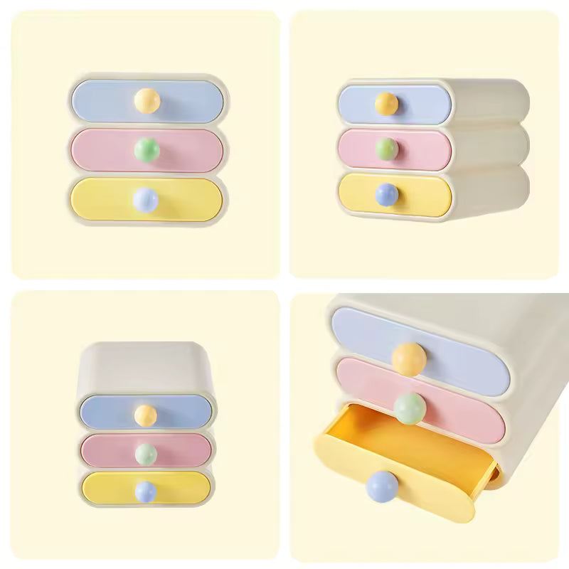 Set of colorful drawers with round knobs on a light yellow background