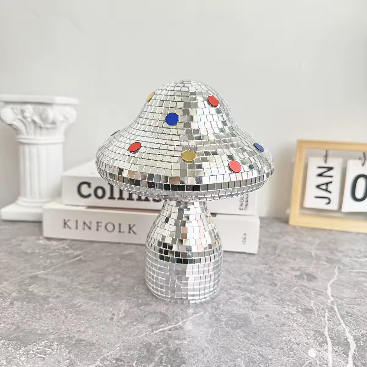 Mushroom disco ornament glowing under LED lights