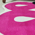 Large pink abstract rug for elegant living room design