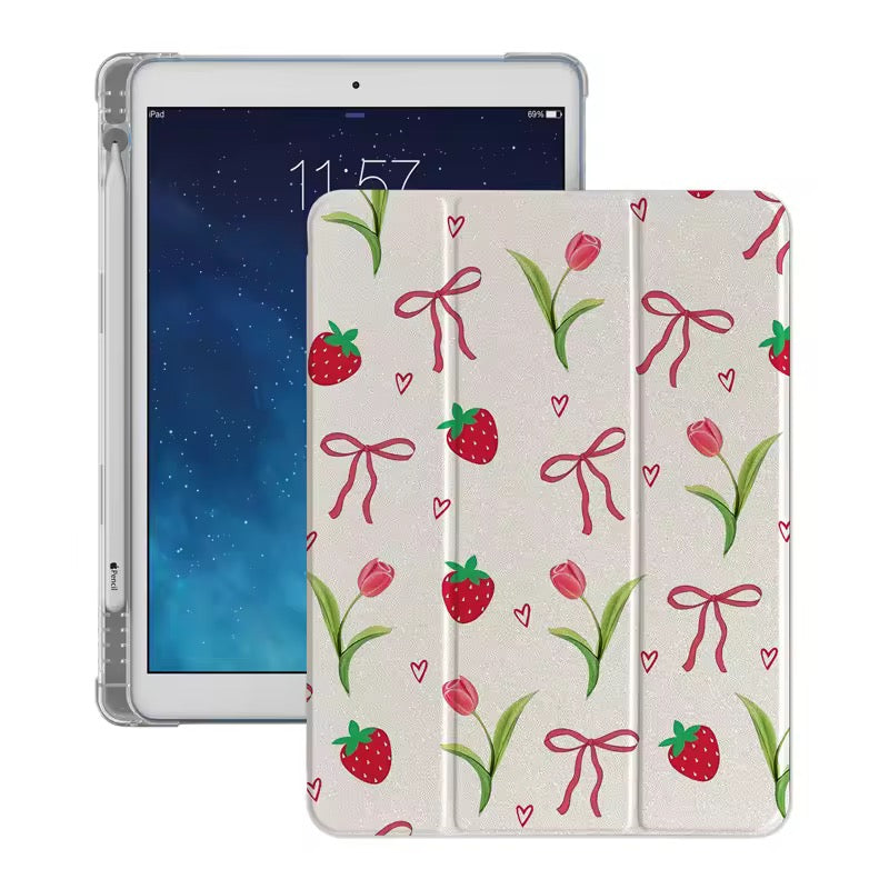 Tablet with a floral and bow patterned case on a white background