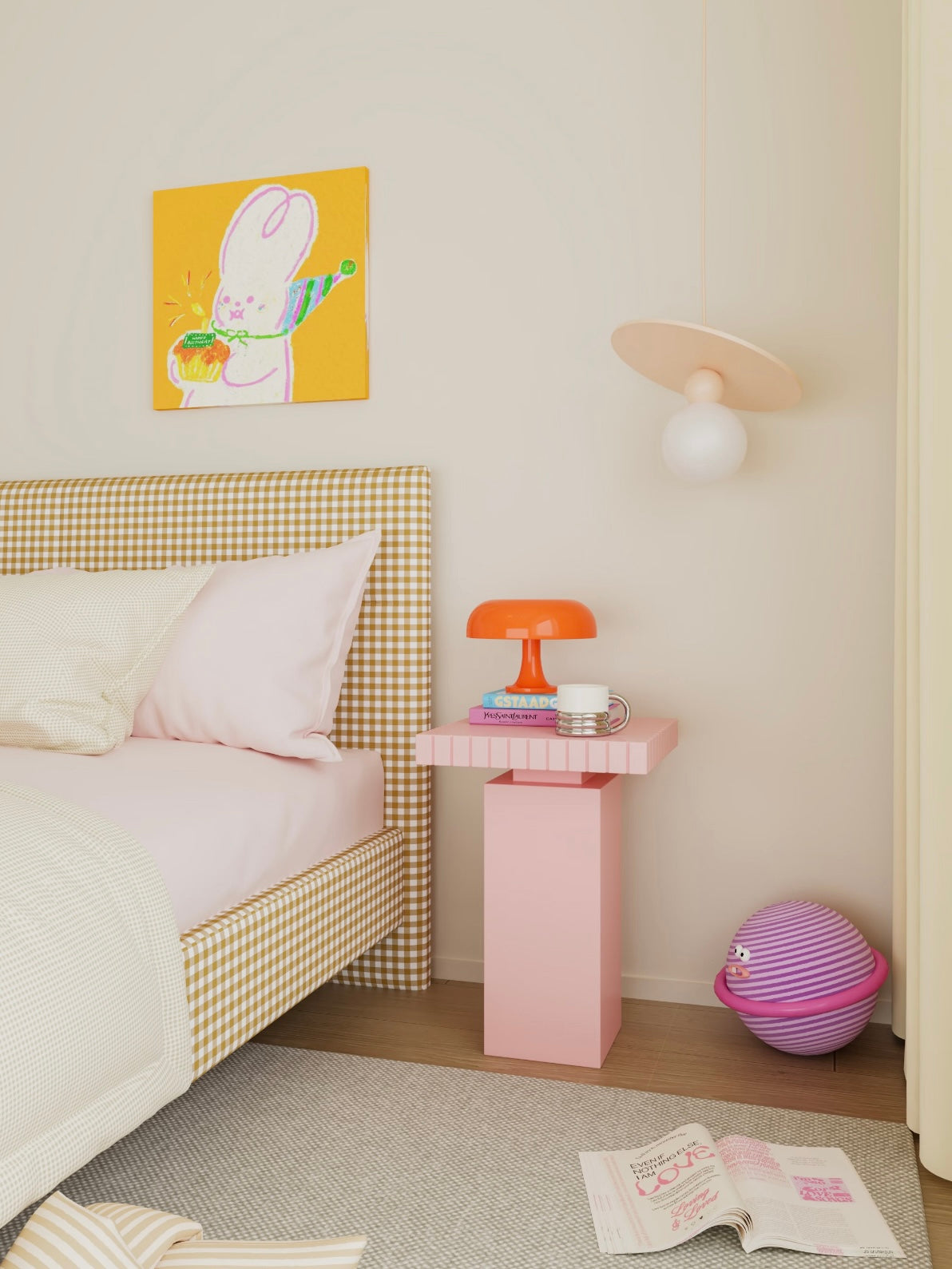 Pink side table used as a nightstand beside a bed
