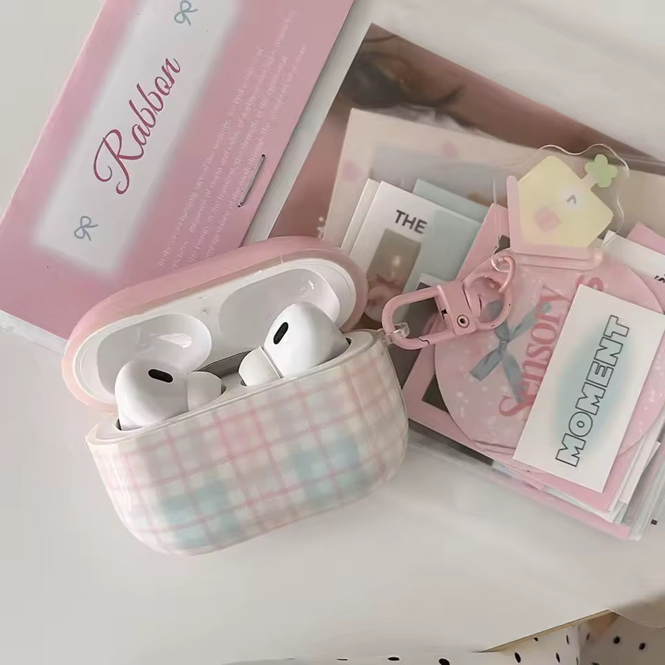 Pink and white checkered product on a pink paper with text, inside a white container.