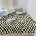 Gingham pattern plush blanket for modern interior