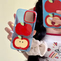 Retro Apple iPhone case with cartoon fruit print on a blue background