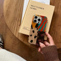 Retro leopard iPhone case with four-color patchwork design