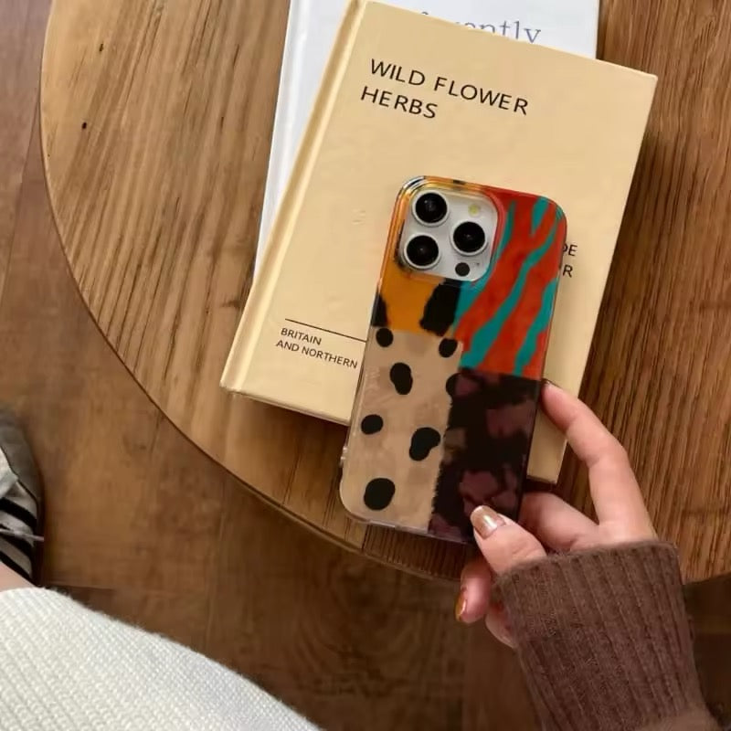 Retro leopard iPhone case with four-color patchwork design