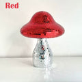 Close-up of quirky mushroom mirror with mirrored surface and sparkles