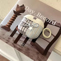 Decorative product with plaid design on a book titled 'Day Record Life'.