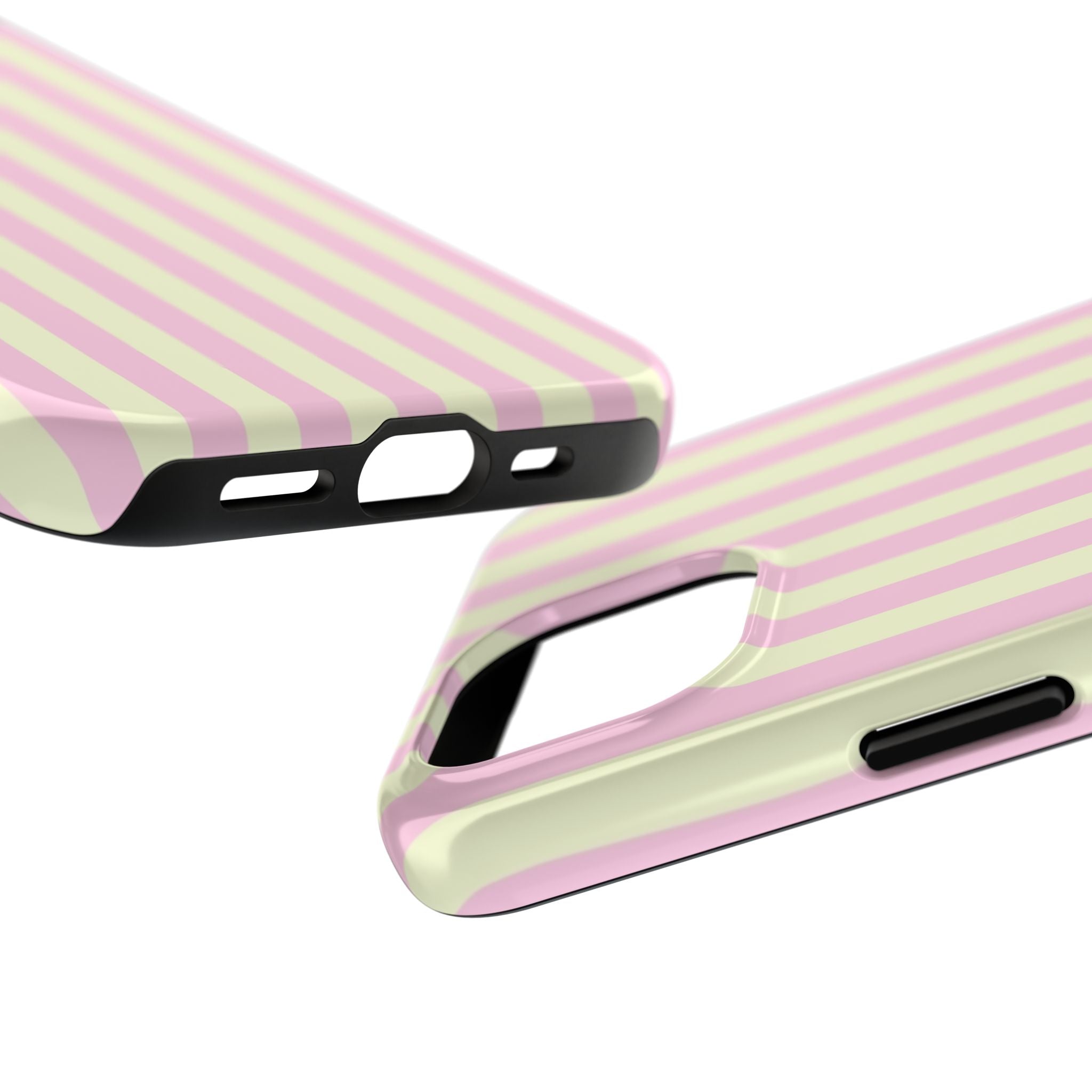 Two phone cases with pink and green striped design on a white background