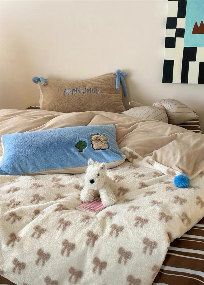 Children's bedroom with a bed, pillows, and a colorful abstract painting on the wall.