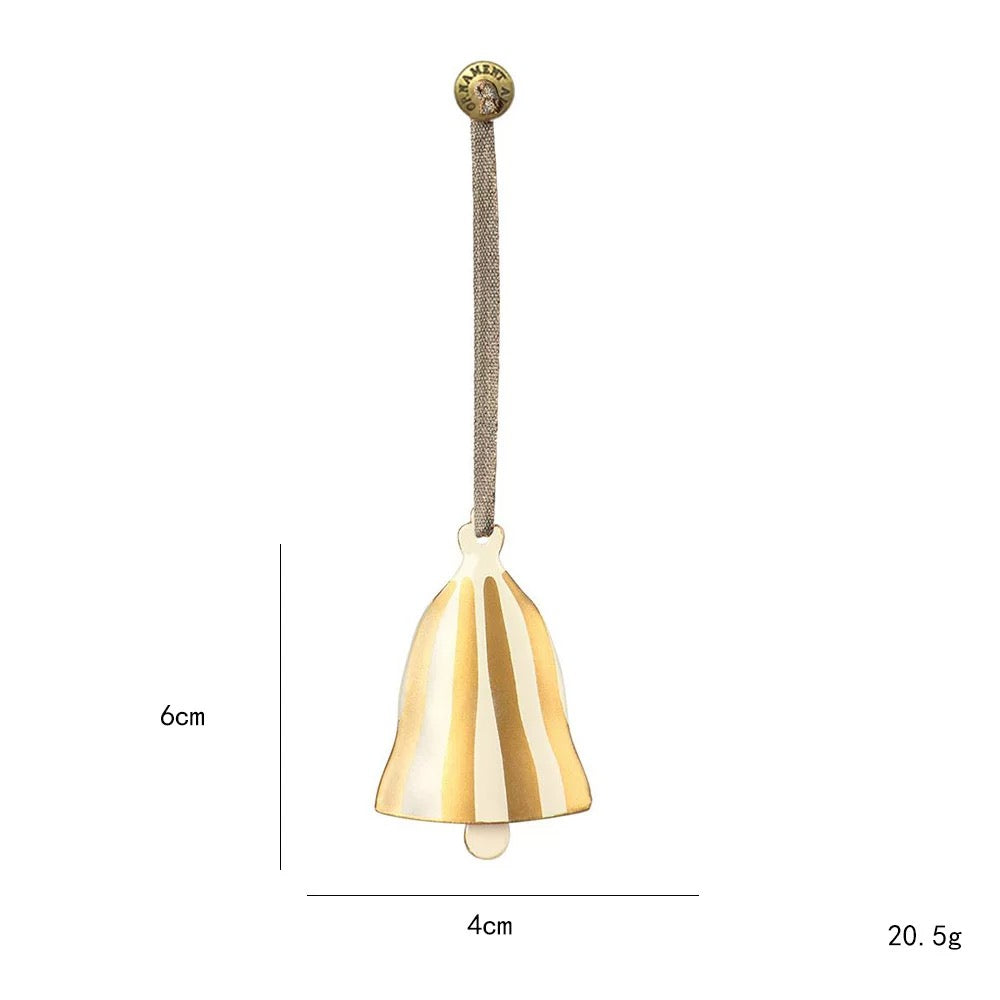 A striped bell Christmas ornament has vertical gold and white panels and a pale clapper below its rim.