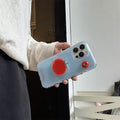 Y2K aesthetic tech accessory with tomato pop grip.