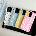 Black and white dot pattern iPhone case with glossy finish — coquette essential