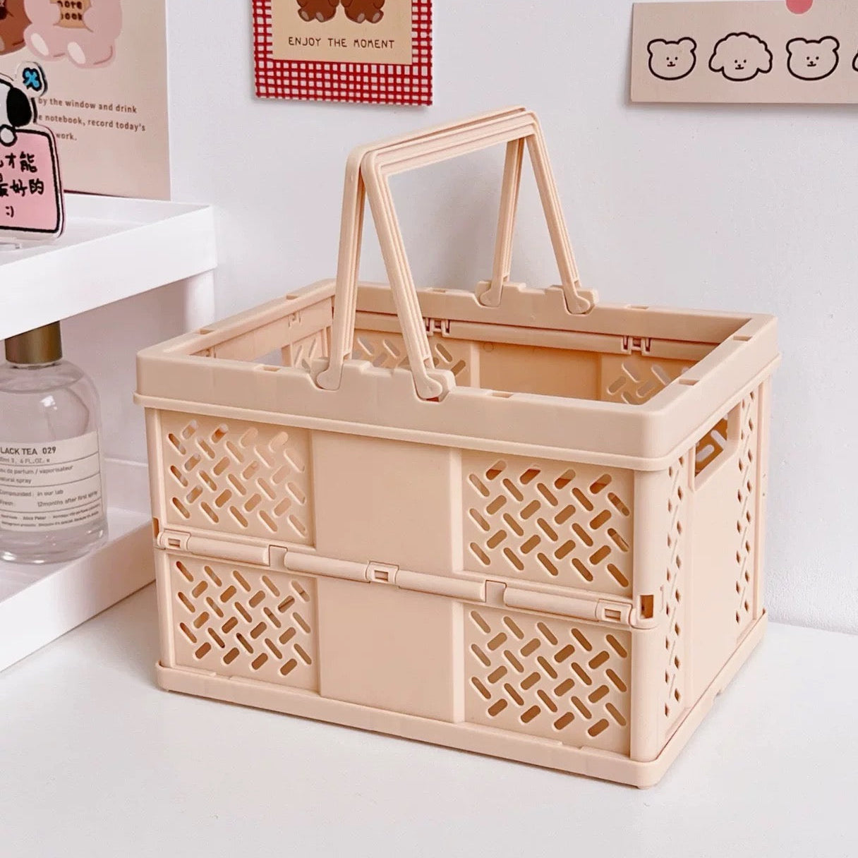 The Feelz pastel folding basket styled in a soft girl dorm setup